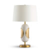 FlowDecor Ovaro Table Lamp in ivory composite stone and metal with antique brass finish and off-white linen tapered drum shade (# 4710)